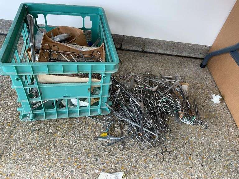 Large lot of surgical instruments, hemostat, and shipping mailers.