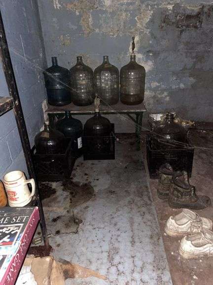 Glass jugs in basement