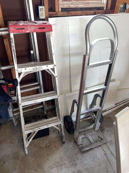 Aluminum ladder and aluminum extension ladder. Also includes nice aluminum dolly, but tongue is cracked.