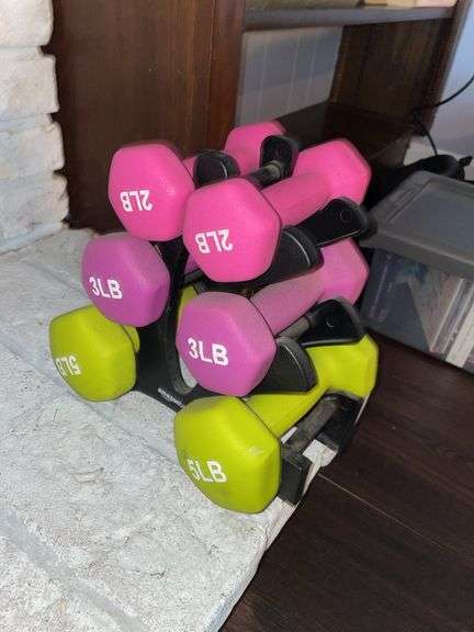 Den. Dumbbell mini rack with a set of 5 pound 3 pound and 2 pound dumbbells. Like new.