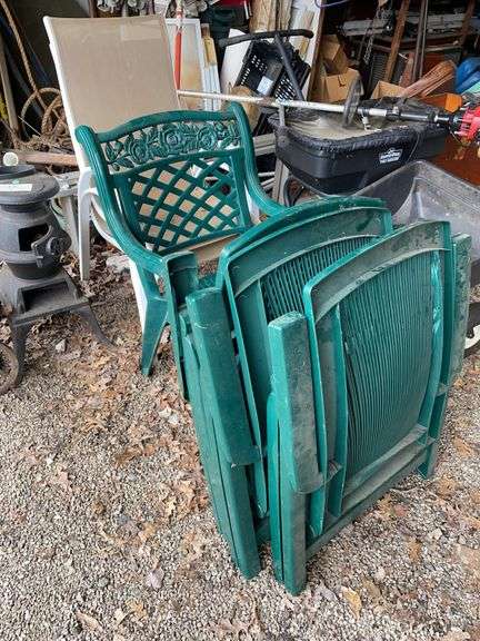 Two mesh garden chairs, and four plastic green chairs