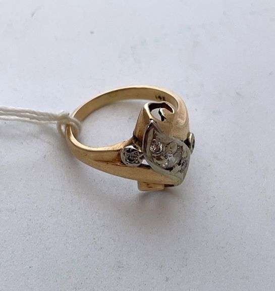 Ladies ring marked 14 K. Tested positive for diamonds. 4.6 g.