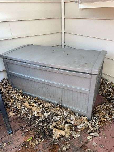 Suncast outdoor plastic storage bin. Approximately 41 inches long by 20 inches deep and 22 inches tall.