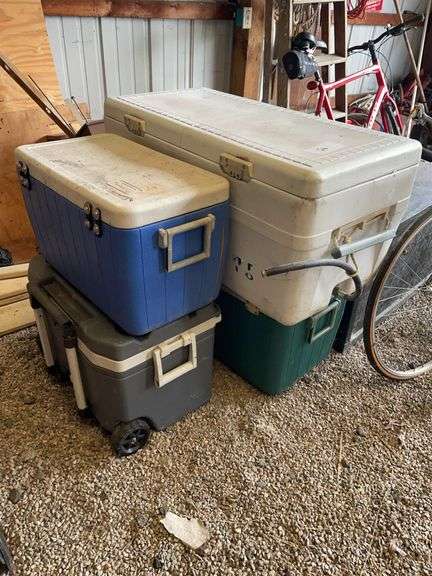 Lot of four coolers, including large, walleye bench cooler.