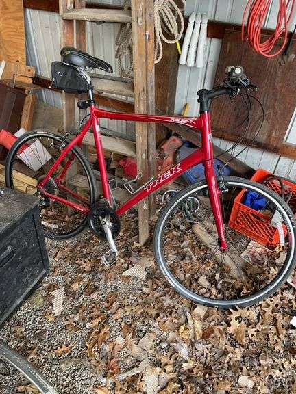 Trek road bike. 25 inch. Appears to be 24 speed with Shimano components. Model 7.3 FX. Very nice Bike.