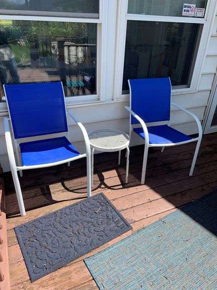 Deck. Two outdoor chairs with side table.
