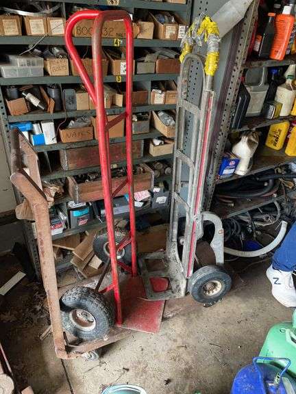 ￼ Lot includes small, rolling metal cart and two hand carts.