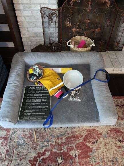 Den. Dog lot. Featuring dog bed which is 42 x 35” with dog bowl, dog leash, dog jacket, dog decor, and dog toys.