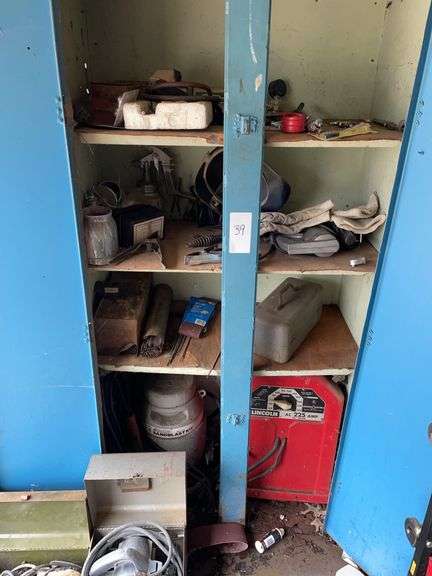Lincoln 225 amp arc welder and speed air sandblast kit needs to be removed from cabinet. Contents of the cabinet are also included with sticks.