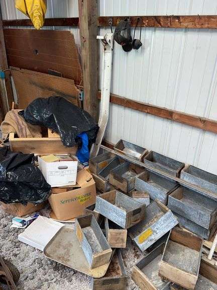 Barn. Right corner of barn, galvanized drawers with mainly wood fronts, some scrap, books.