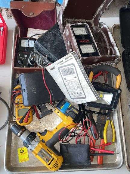 Miscellaneous tool tray. Volt meters. Small LED floodlight. DeWalt cordless drill and more.