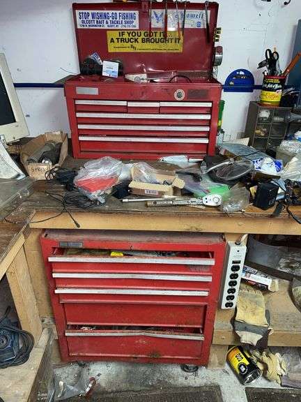 Rolling tool chest with top. Filled with miscellaneous tools, bits, and hardware.