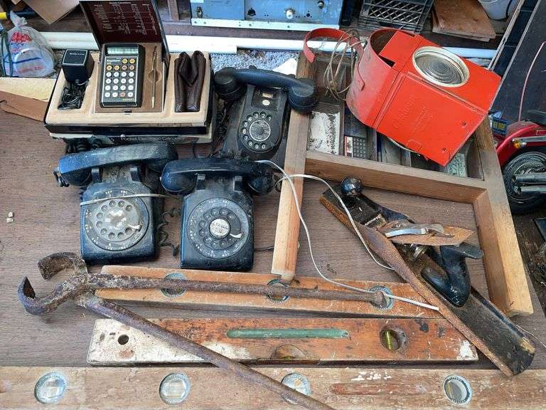 Barn: vintage phones, including early PTT, signal lantern, plane, and vintage items.