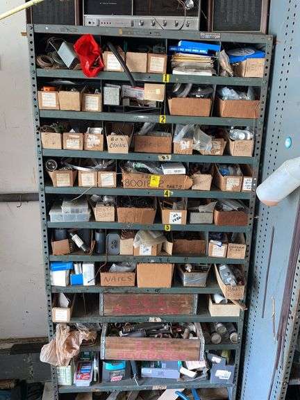 Contents of shelf. Includes tons of hardware. Plumbing elbows. Some copper. Caulking. Switches outlets and more. Take what you want. Leave the rest.