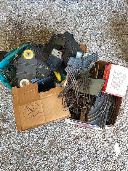 Large selection of slot car, track, and model train track