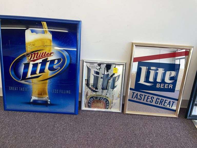 Three Miller light signs. The largest being approximately 32 x 26”.