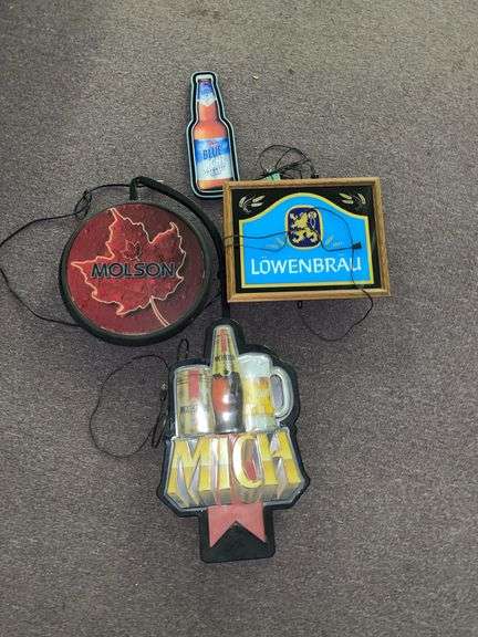 (4) light up beer signs. That are not lighting up featuring Michelob Molson, Lowenbrau and Labatt Blue