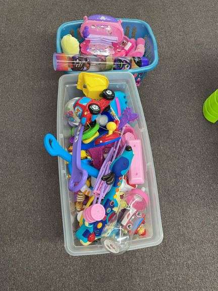 Two bins full of children’s toys