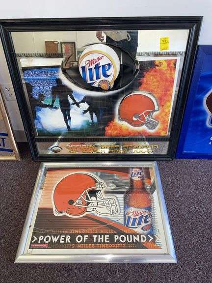 Two Cleveland Brown Miller light signs. The larger one is approximately 33 x 29”.