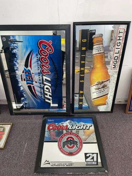 Three mirrored beer signs featuring Coors light Coors light Ohio State sponsor and Miller genuine draft light. Coors light Super Bowl sign being approximately 44 x 32”.