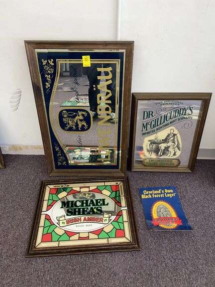 Three mirrored bar signs. Lowenbrau is approximately 33 x 22”. Also includes Cleveland’s own black forest logger cut out.