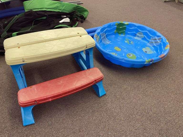 Summer waves kids swimming pool. Approximately 34 inches across and small kids table and bench. Approximately 25 inches long and 16 inches tall.