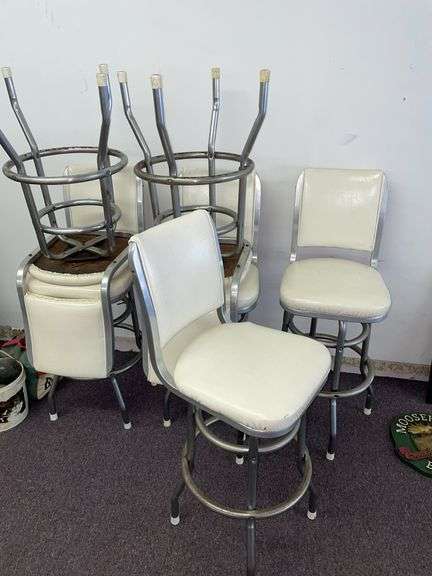 Six vintage bar chairs in white. Used but in  pretty decent condition.