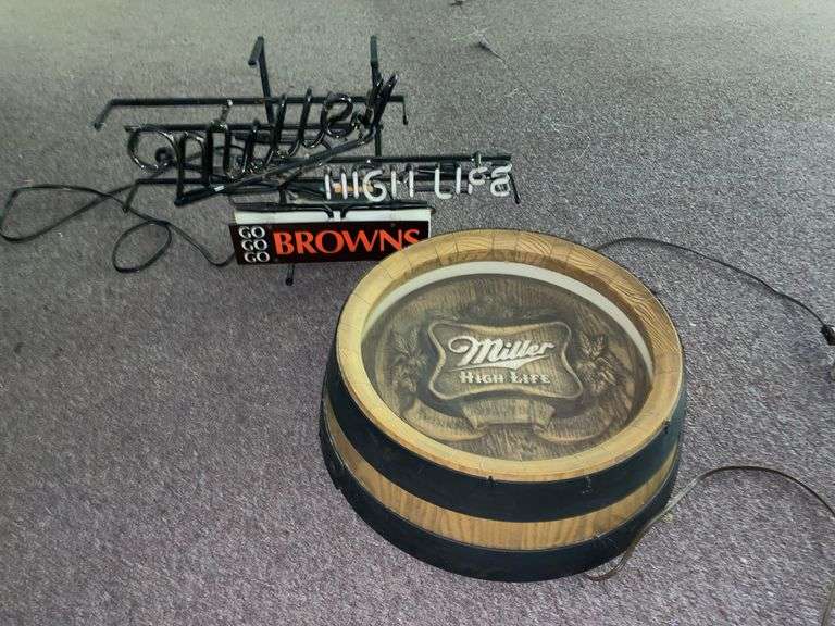 Miller highlife Brown’s neon sign when plugged in buzzes, but doesn’t light up and a Miller highlife light up barrel sign that doesn’t light up when plugged in. May just need replacement bulb or minor repair.