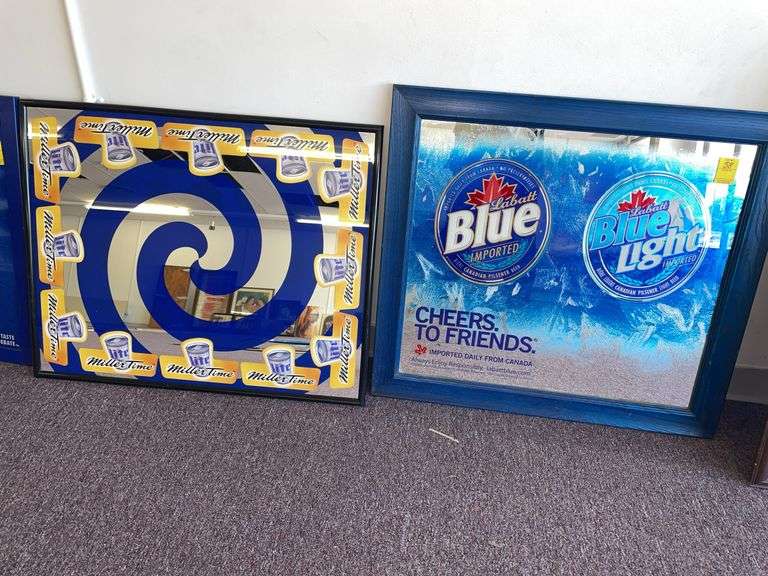 Two beer signs, Labat blue and Miller time Miller light. Miller light is approximately 25 x 30”.