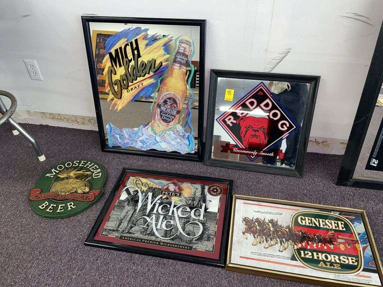 Five beer signs featuring Moosehead Petes, wicked ale, 12 horse ale, red dog and Michelob golden draft
