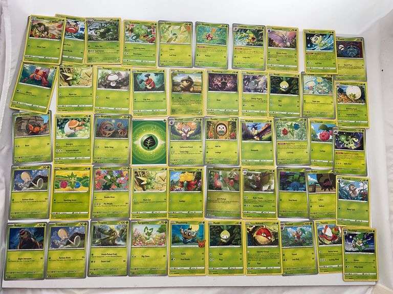 Lot of Pokémon cards featuring holographic Exeggcute