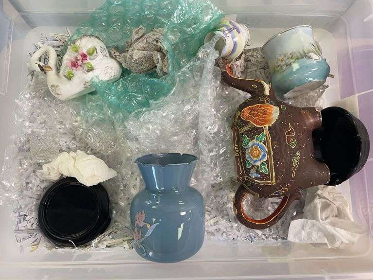 Plastic storage case with decor. Case is included.