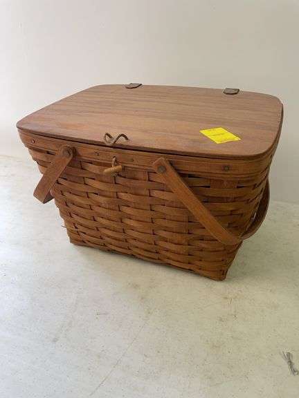 Longaberger picnic basket. With some picnic accessories inside.