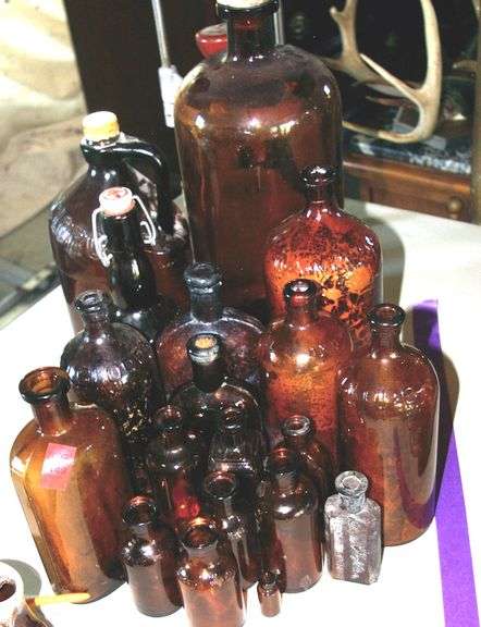 Large Collection of  Amber Glass Medicine Bottles