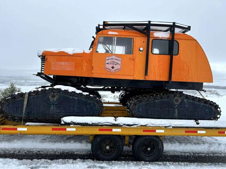 1952 Tucker 443 Sno-Cat with a Trailer