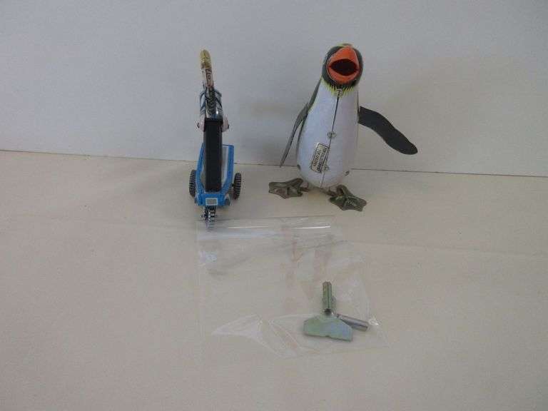 2) Metal Wind Up Collectibles