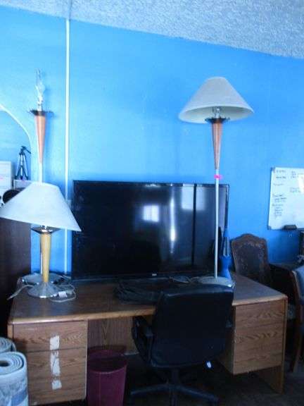 Desk, 2) Floor Lamps, Table Lamp, RCA 55" TV, Office Chair, Laptop Bag, Trash Can