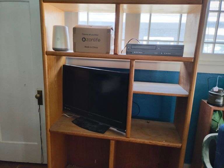 Entertainment Center Including Contents, Magnavox DVD/VHS Player, Ozonlife Air Purifier, Emerson TV