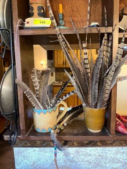 Bird Feathers and Clay Mugs