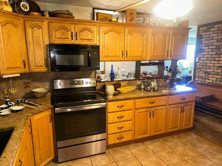 Contents of Kitchen Cupboards: Glasses, Mugs, Pots, Pans, Cleaning Supplies