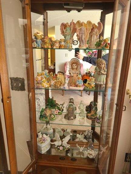 * Contents of Curio Cabinet: Angel Statues, Children Statues, Swan Statue, Ceramic Trinket Box, Bear Statues and More