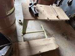 Work Table, Tow Hitch, Barrel, Assorted Metal Tins-Contents of Area