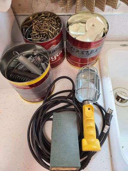 Cans of Casters, Springs, Chains.  Drop Light, Veterinary Syringe