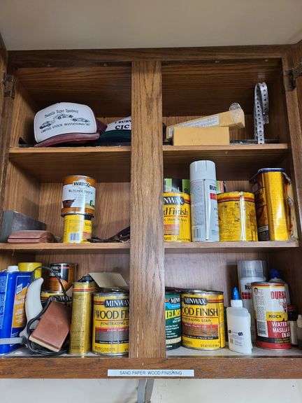 Assorted Wood Finishing Stains, 2) Ball Caps, Hand Sanders, Glue – Contents of Cupboard
