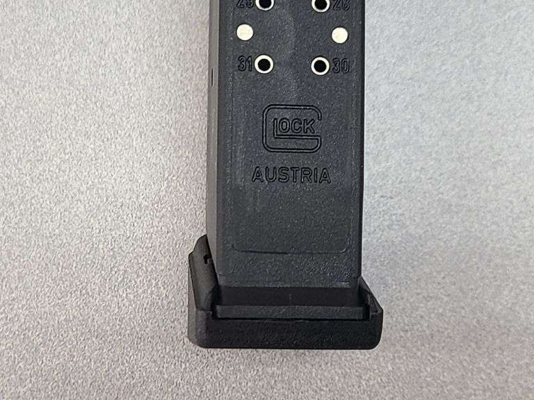 1) 9mm Magazine, 1) .45 Magazine