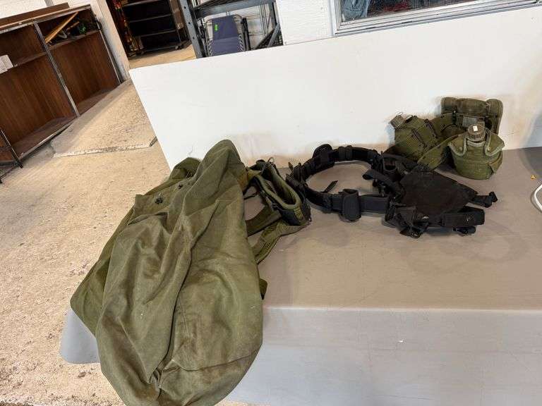 Canteens in Carrier Belt, 2) Duffle Bags, Utility Belt