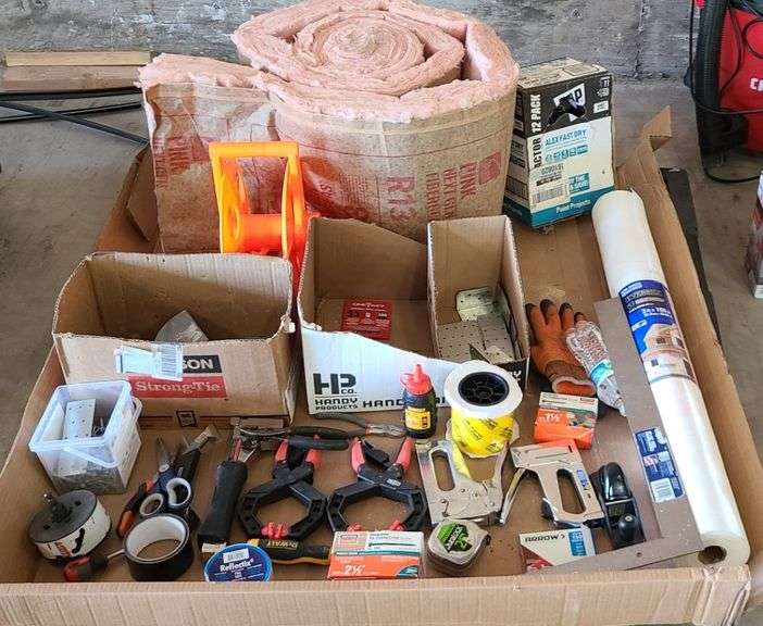 Pallet w/ Assorted Home Improvement items: Insulation, Scissors, Staple Guns, Nails, Framing Square, House-Wrap, 4pk. Dap Caulk, etc.