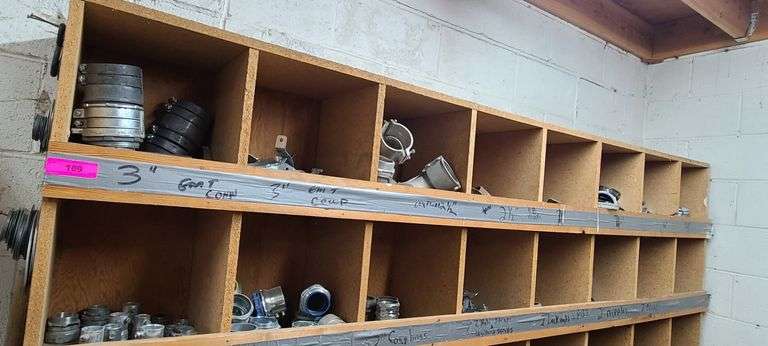 Contents of Top Two Bins: EMT Couplers, EMT Connectors, Angle Couplers, Locknuts, Nipples and More