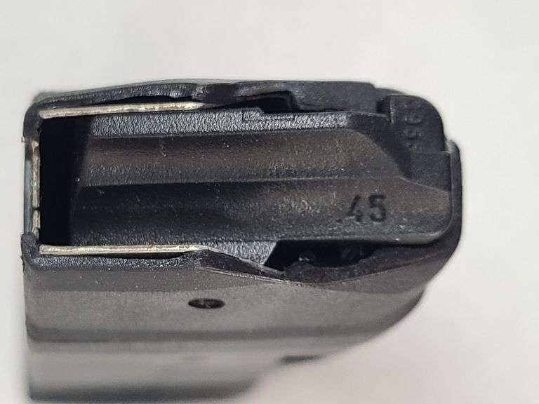 1) 9mm Magazine, 1) .45 Magazine