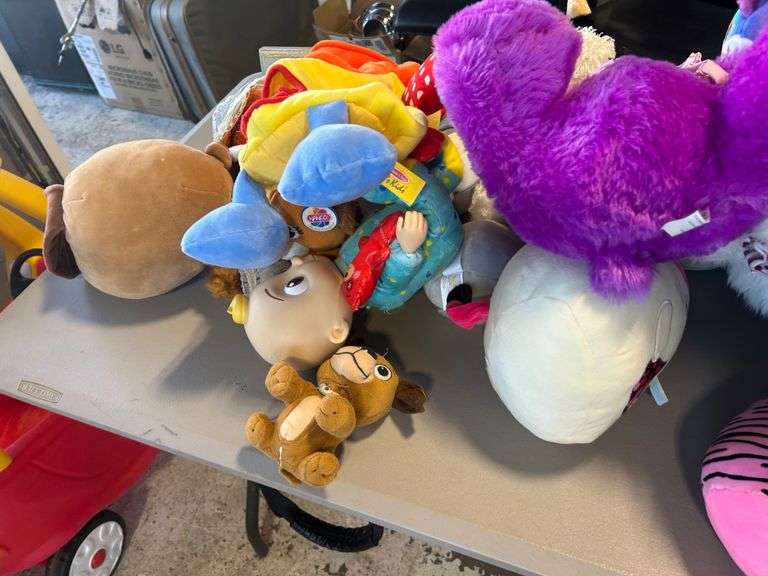 Contents of Table: Plushes, Stuffies, Toys
